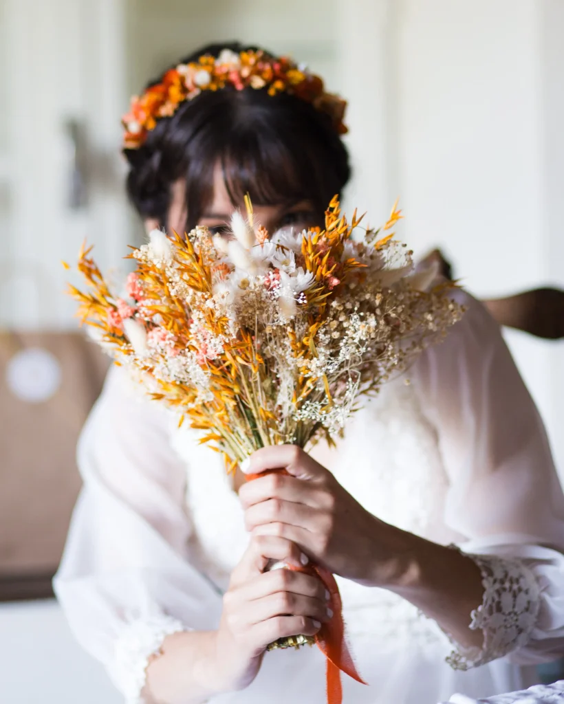 Bouquet mariage orange séchées mariée Cachee